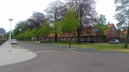 gestaltung-der-nieuwluststraat-mit-einfacher-bebauung-freiflache-und-spielplatz-in-enschede-roombeek-nl.jpg